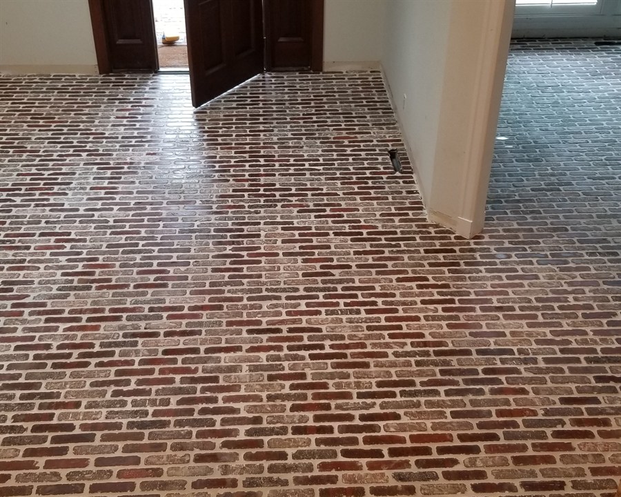 Brick-pattern tile flooring in a home entryway