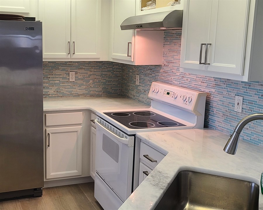 Blue and gray glass mosaic tile backsplash